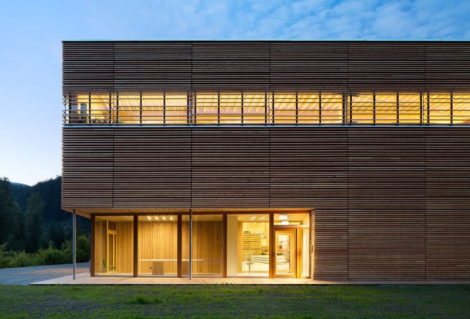 BC House Factory exterior with lit windows