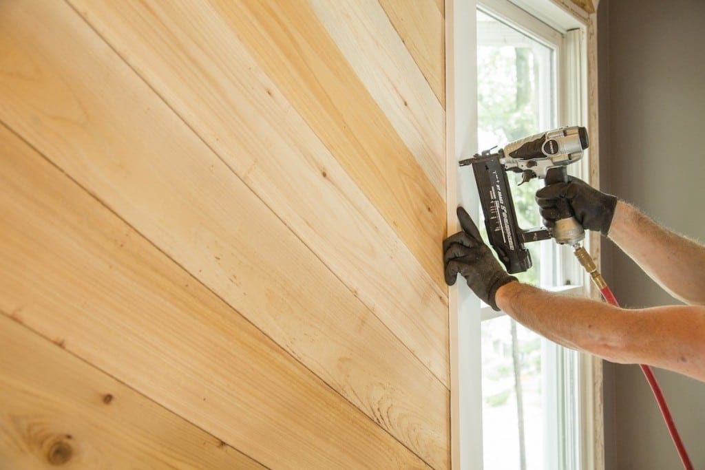 Wooden panels inside a home during the day