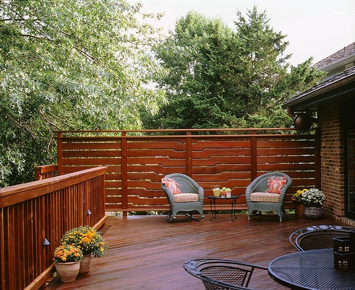 A redwood deck with patio furniture