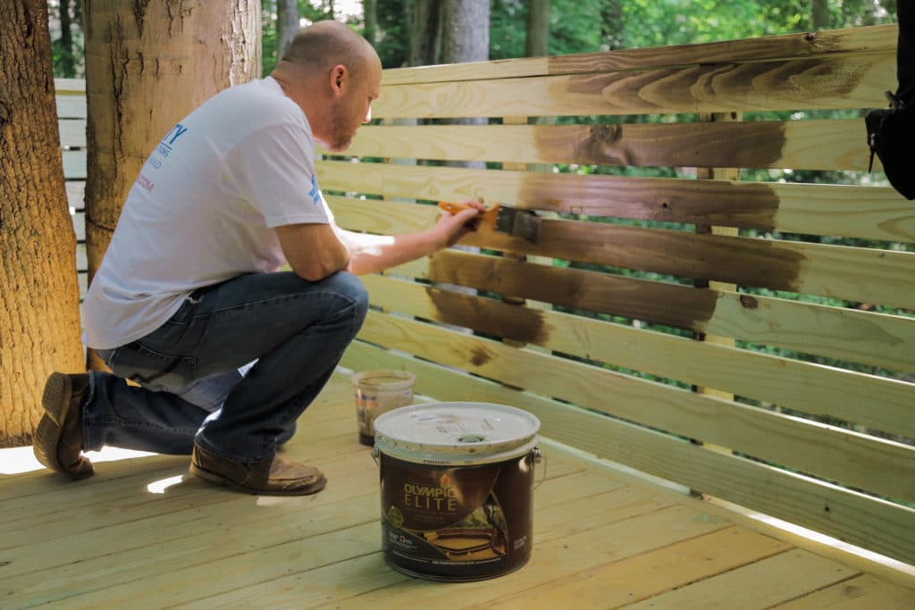 Photo of a step in building a tree encompassing deck